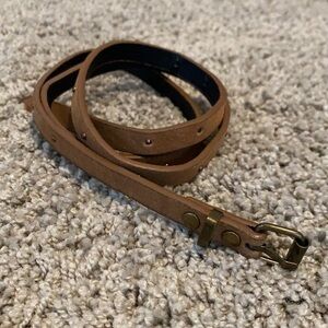 Thin light brown studded belt